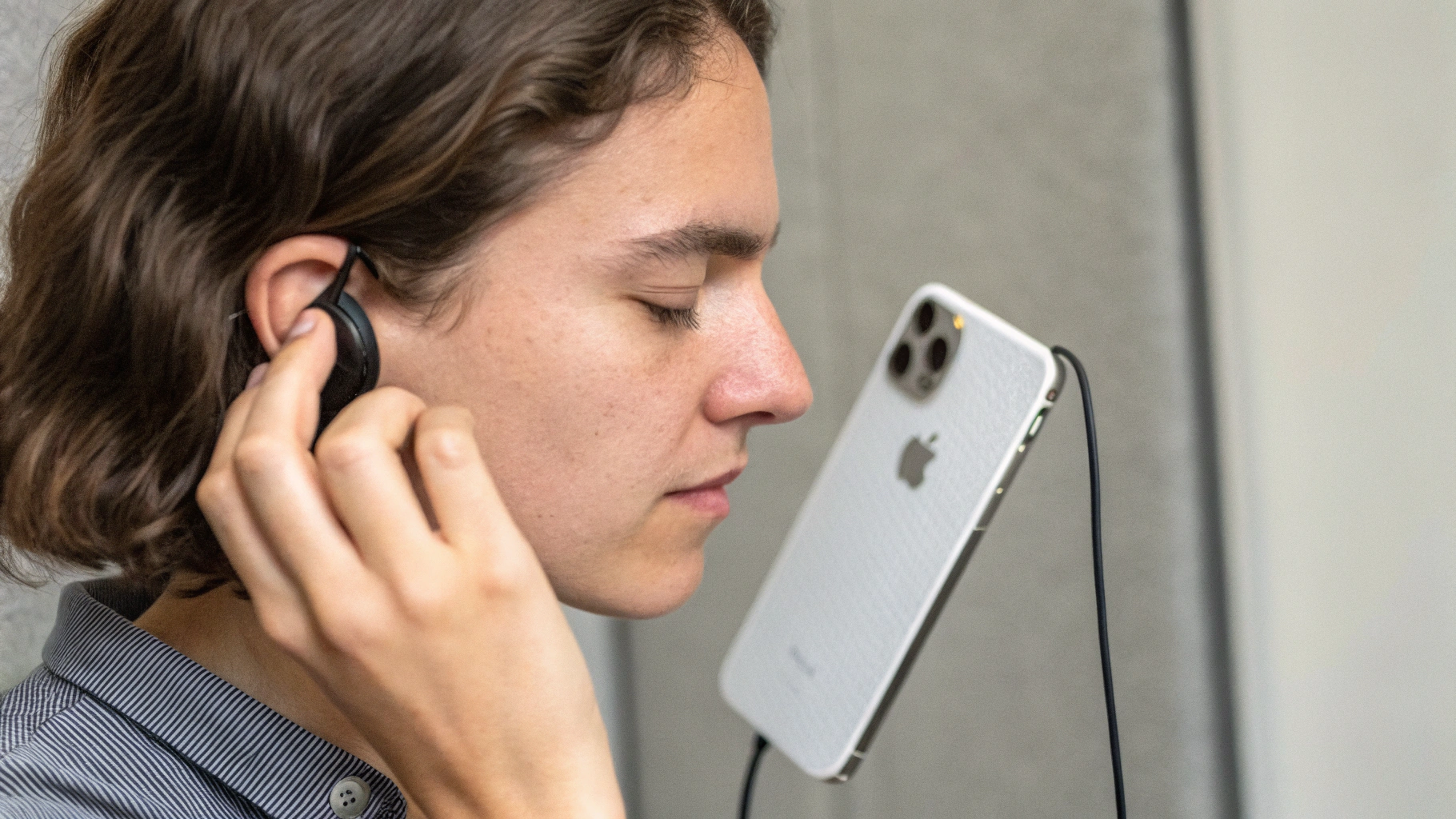 Процесс персонализации «Пространственного аудио»: сканирование ушей на iPhone