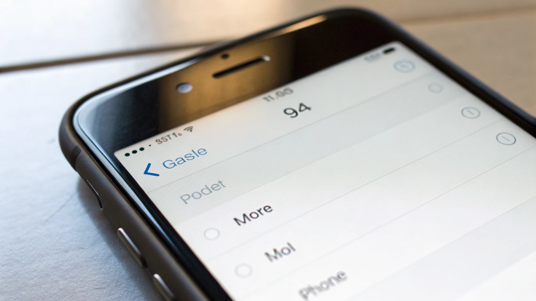Экран «Об этом устройстве» на iPhone с номером модели и Part Number для проверки региона